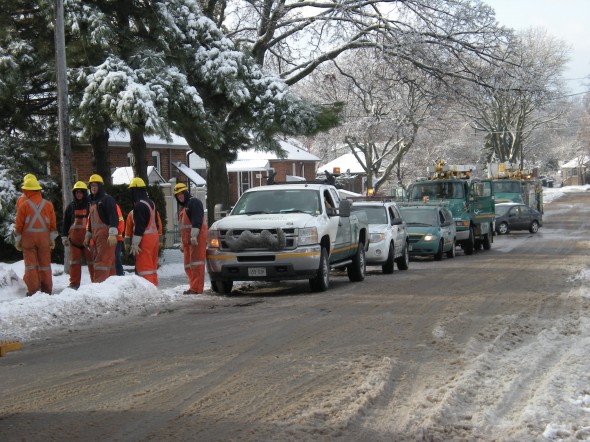 The Manitoba Hydro crew arrives in eight vehicles. A sight for sore eyes, for sure.