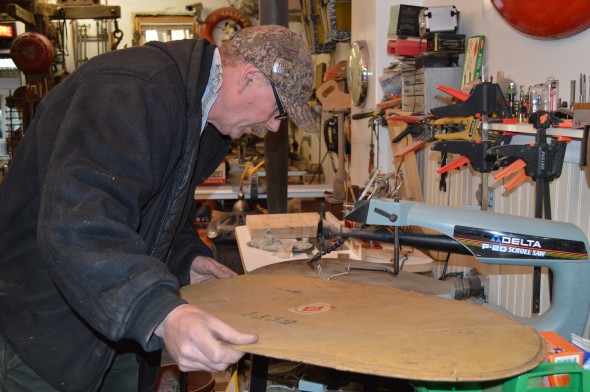 Roy Clifford, owner of The Salvage Shop, at work