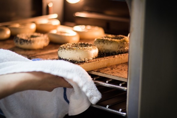 Bagels coming fresh out of the oven at M & J's Eastside Deli.